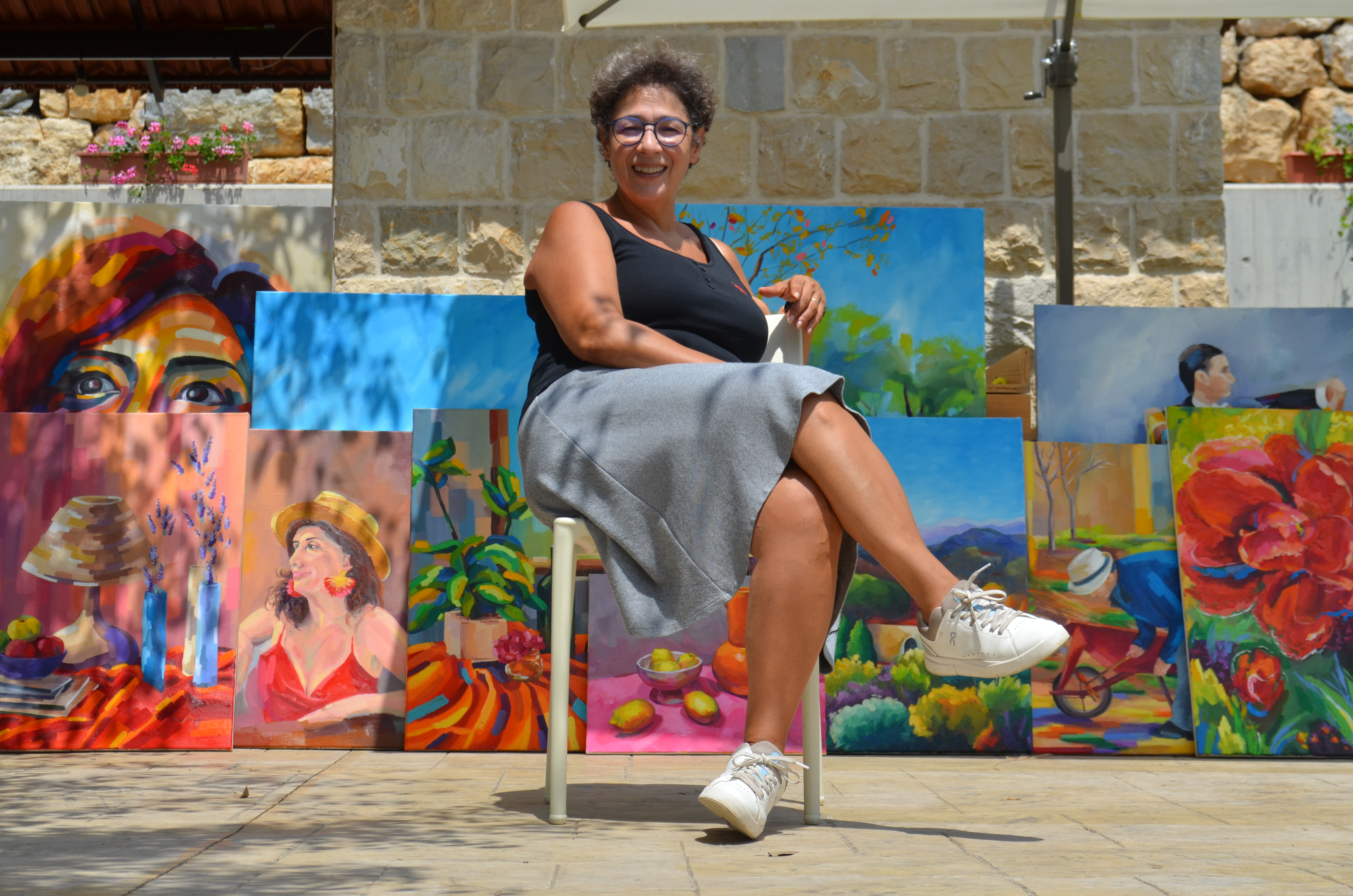 Aline Nassar with her artwork